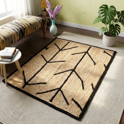 Braided jute rugs with black border