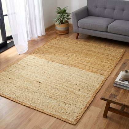 Ivory and natural braided jute rug